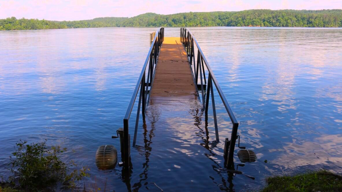 A dock in the lake with the entrance to the dock under water